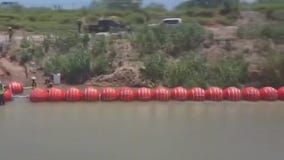 DOJ sues Abbott over floating border wall