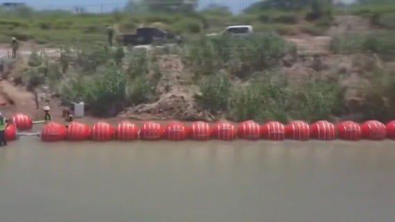 DOJ sues Abbott over floating border wall