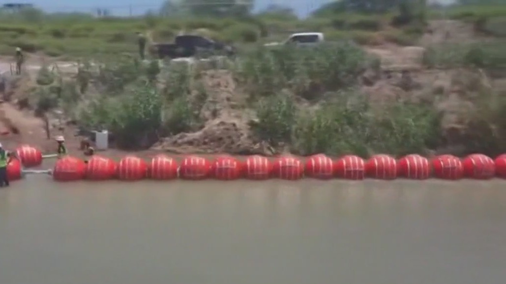 DOJ sues Abbott over floating border wall