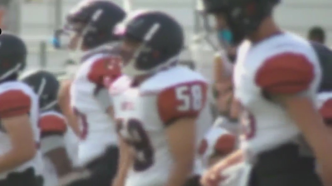 Austin football player suffers heat stroke