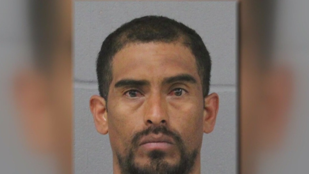 Man throws rock at car and injures woman