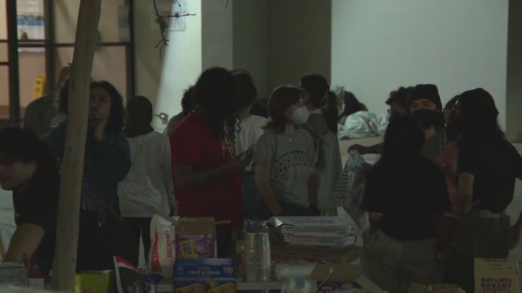 Friends, family of protesters waiting outside jail