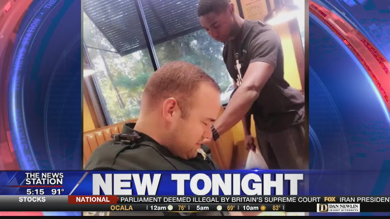 Young man prays over Florida deputy