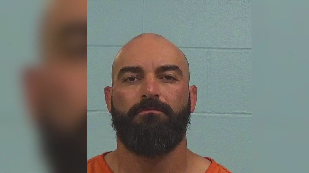 APD officer turns himself in