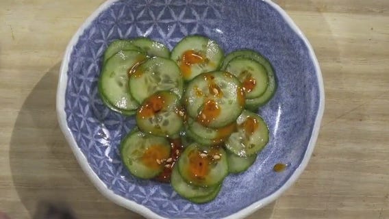 Cucumber salad and frito pie from Texas Sushiko