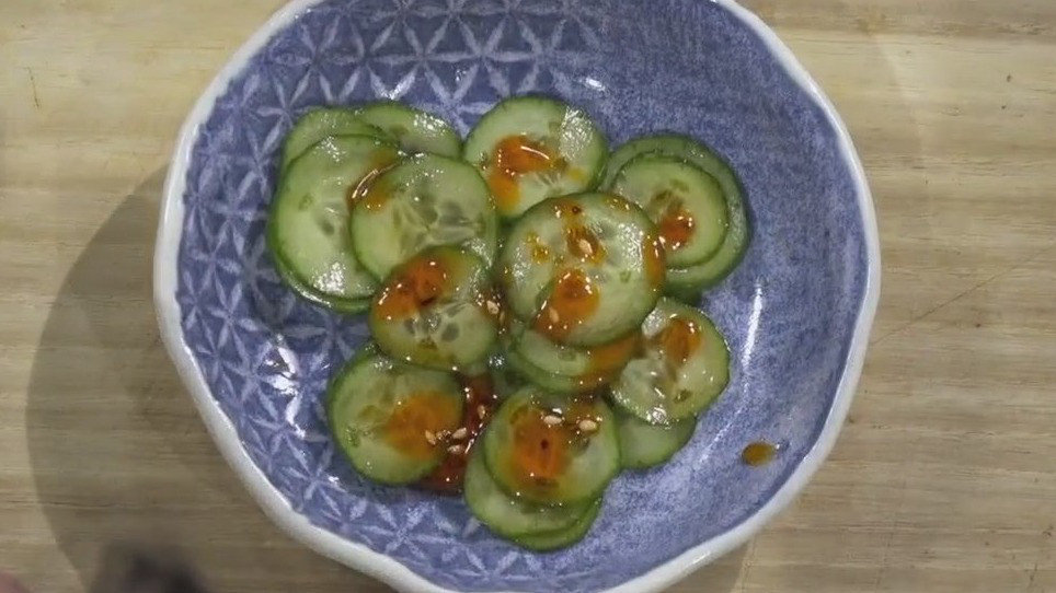 Cucumber salad and frito pie from Texas Sushiko