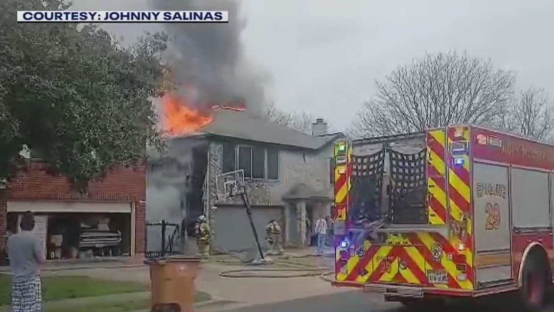 Fireplace ashes cause 2-house fire