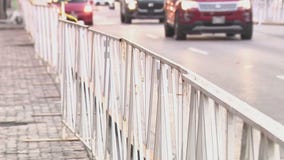 Replacing damaged 6th Street fencing