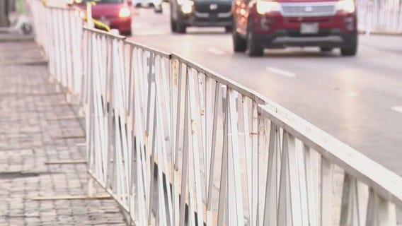 Replacing damaged 6th Street fencing