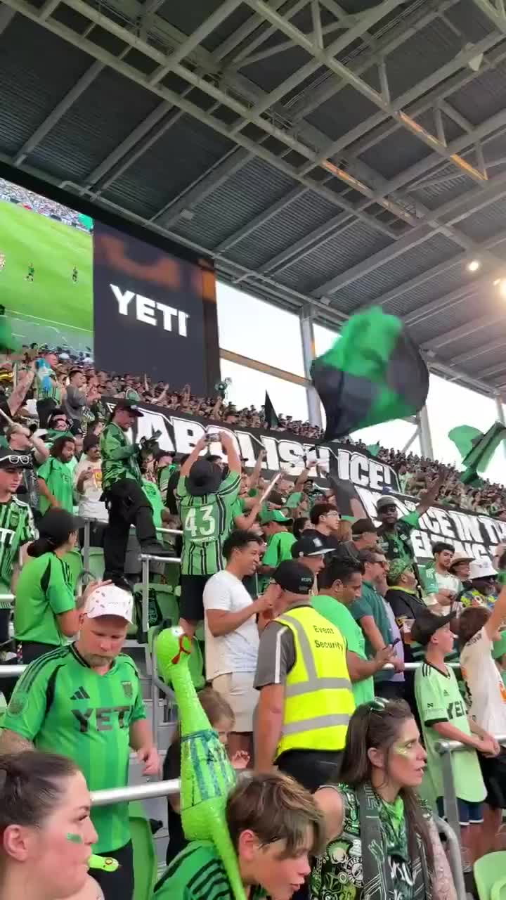 Austin FC fans display "Abolish ICE" banners
