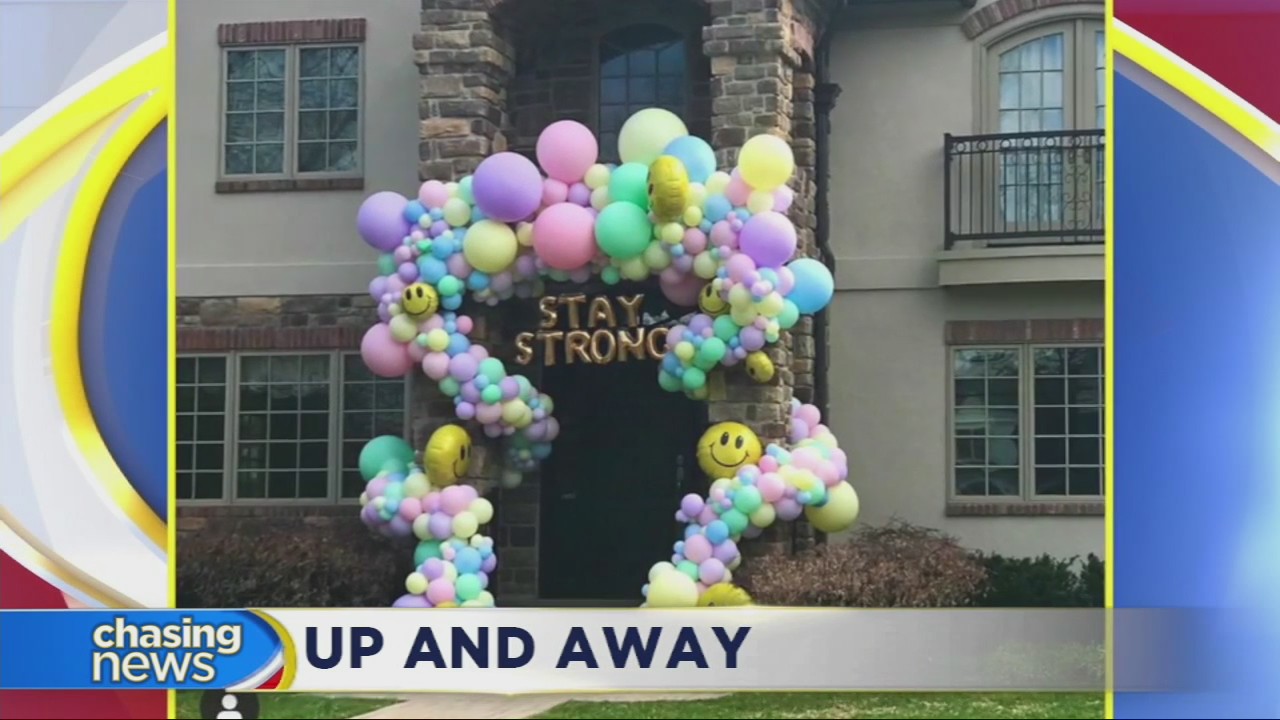 Balloon artist filling a local community with positive messages