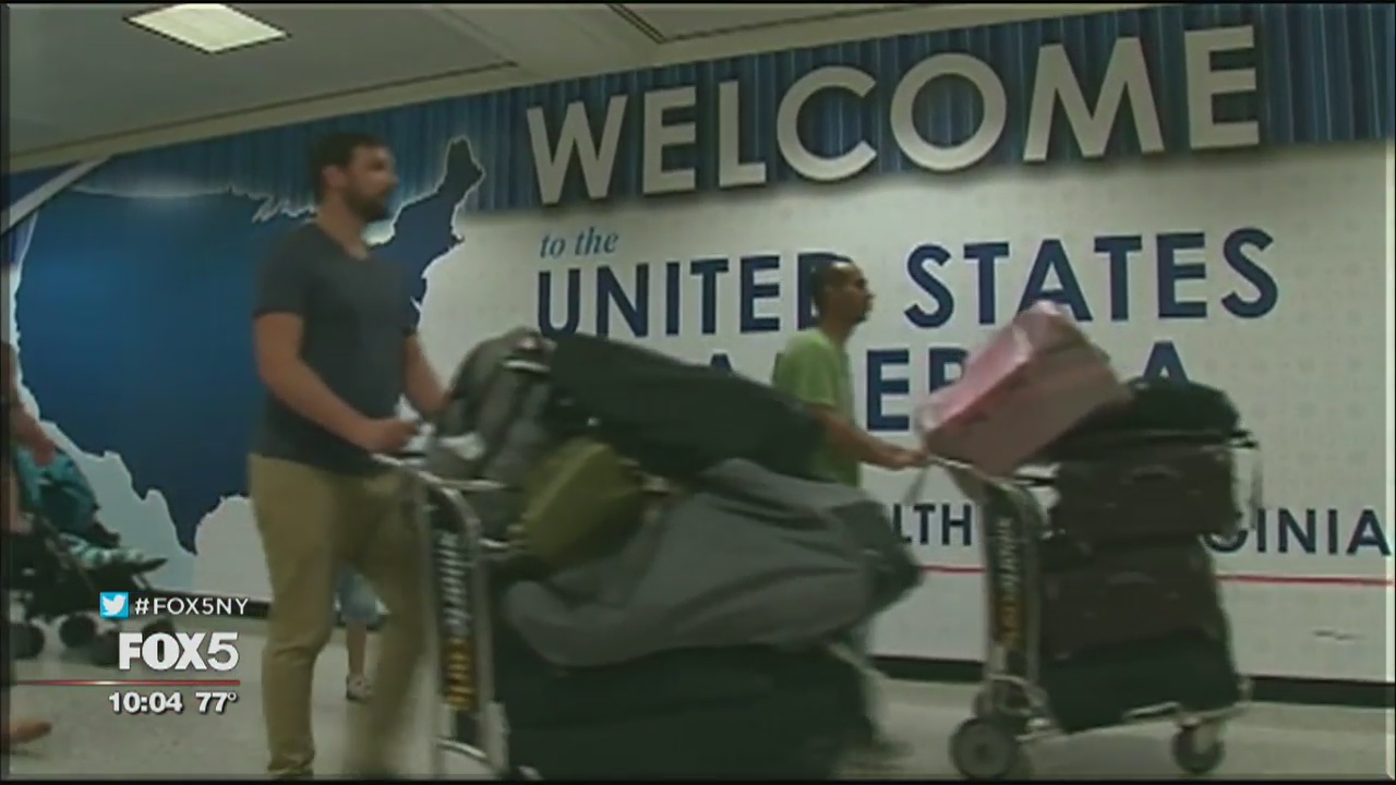 Altered Trump travel ban in effect