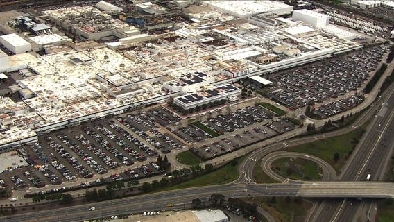 SkyFOX over Fremont Tesla plant as vehicle production continues without interruption