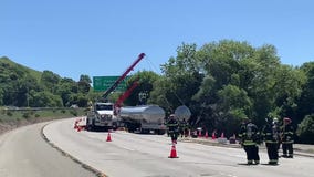 Hazmat teams work to transfer ethanol from crashed tanker