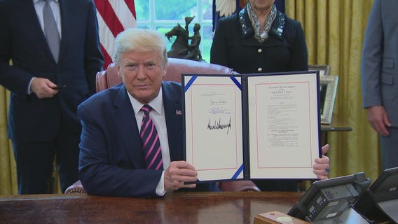 President Trump answers questions after signing stimulus bill
