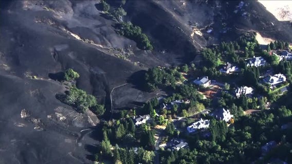 Aerial view over Moraga after Merrill Fire