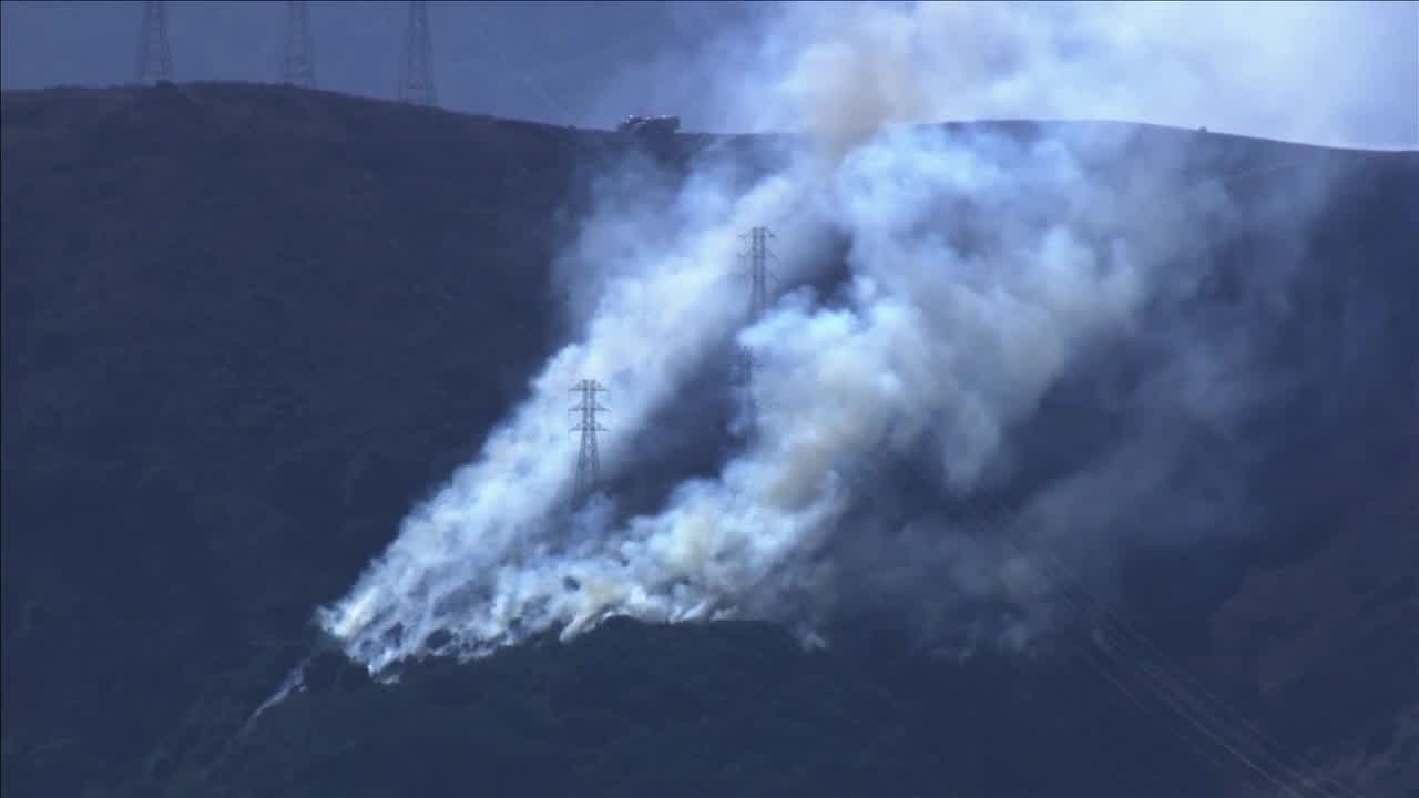 Firefighting aircraft respond to quickly contain San Bruno Mountain Fire in Brisbane