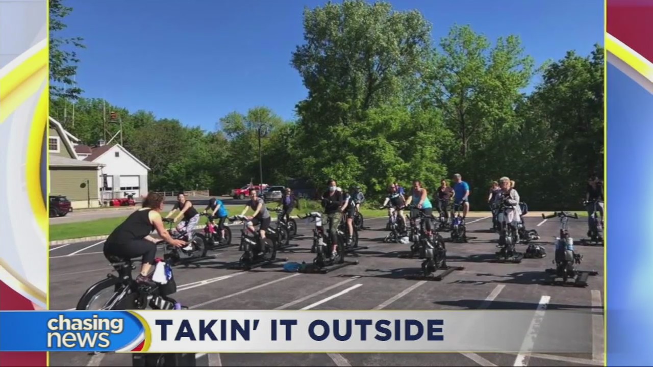 A fitness studio owner takes her clients outside to avoid breaking the rules