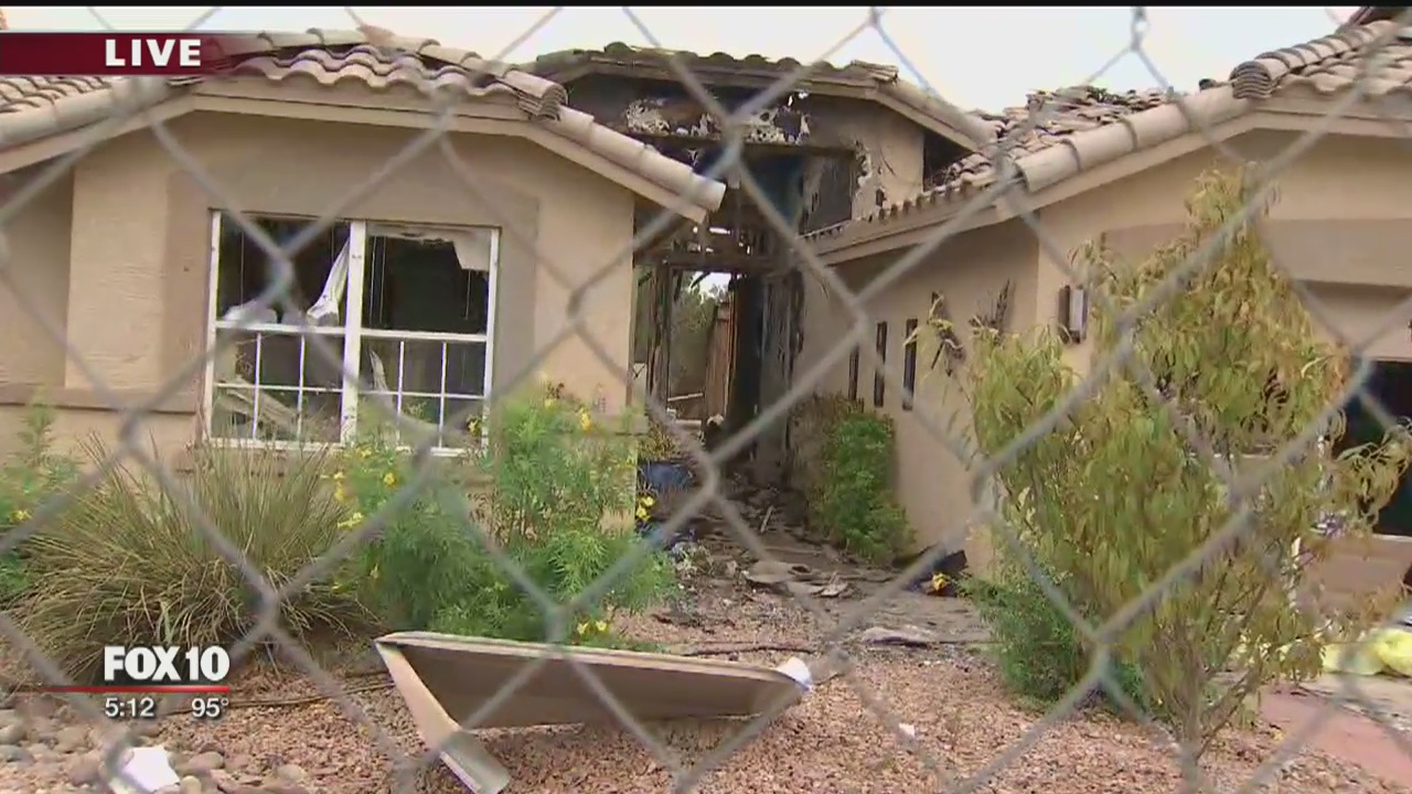 Pilot called for help before plane crashed into home