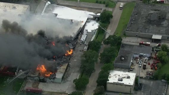 Crews battle Houston warehouse fire