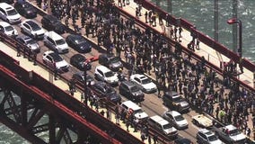 Protesters march into traffic on the Golden Gate Bridge