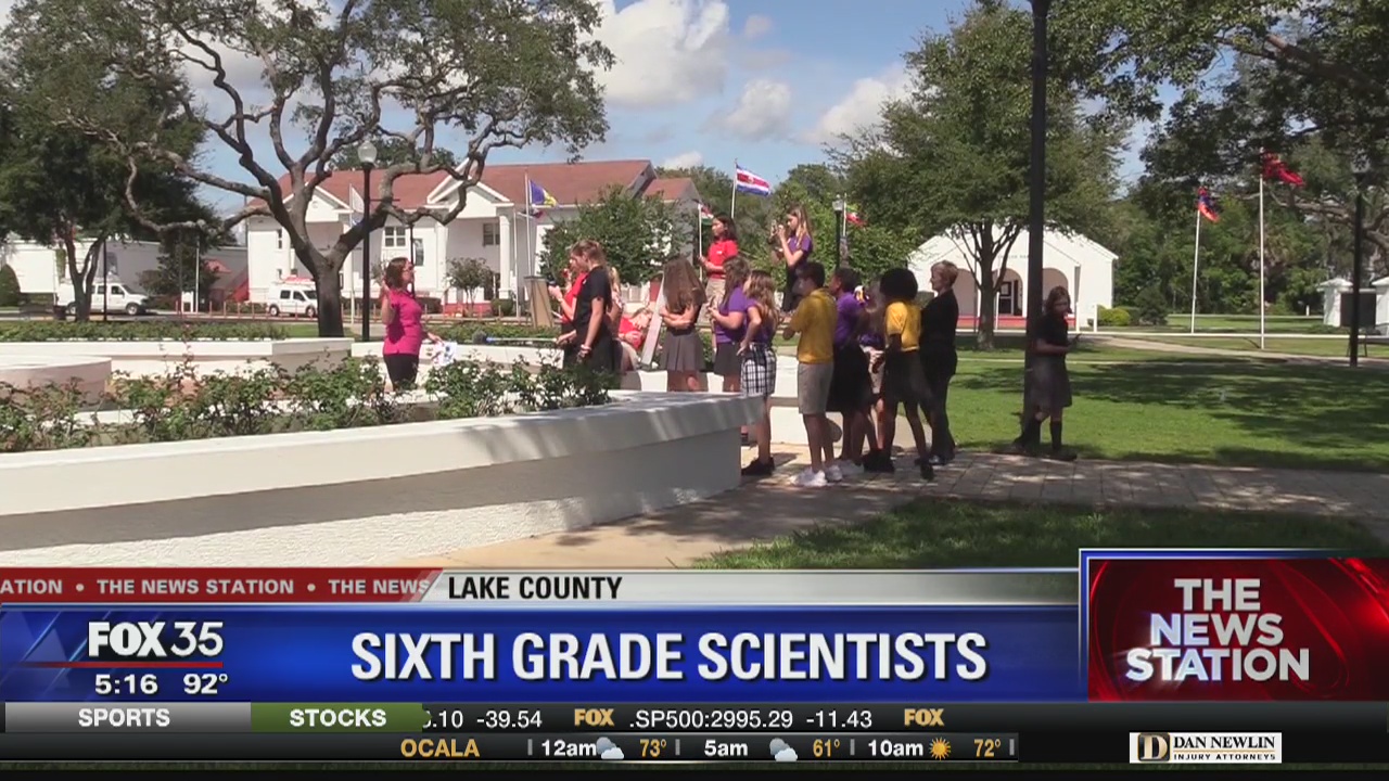 Students collecting environmental data to assist NASA