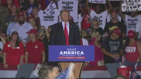 Watch the awkward 10 minutes Donald Trump spent on stage after his rally ended