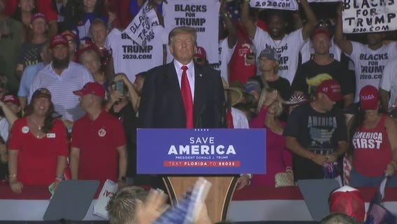 Watch the awkward 10 minutes Donald Trump spent on stage after his rally ended