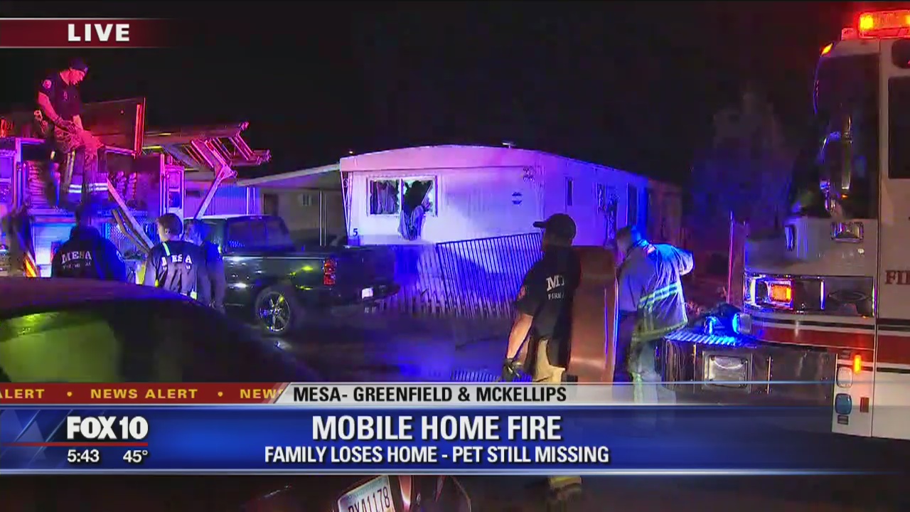 Family of 4 displaced after fire damages mobile home