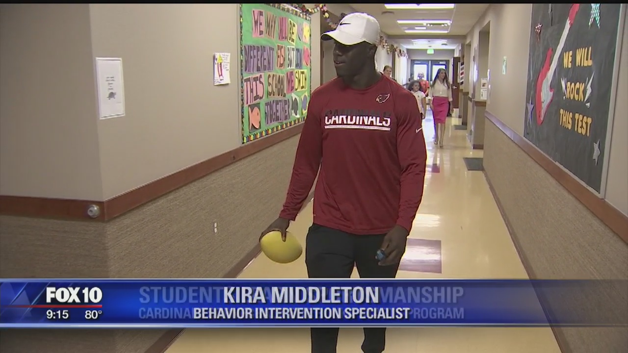 Arizona Cardinals cornerback Elie Bouka teaches sportsmanship at local academy