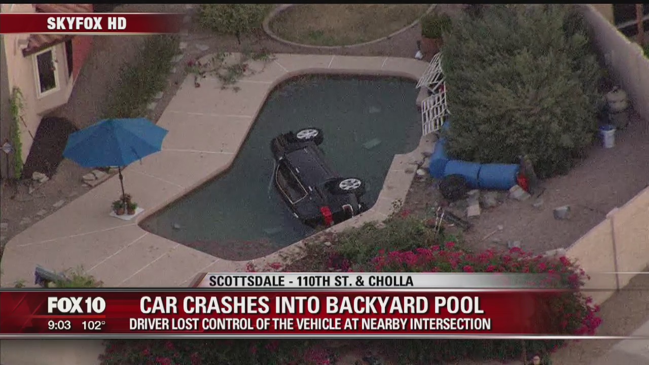 Driver rescued from car that plunged into Scottsdale backyard pool