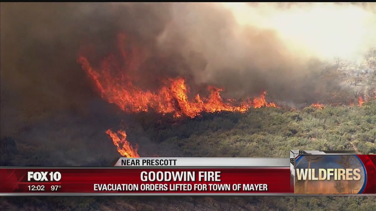 Residents leave homes as wildfires sweep through the southwest