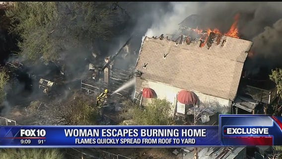 Woman escapes house fire in Cave Creek that spread to yard and brush