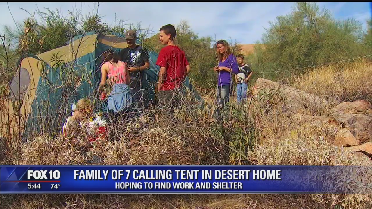 HARD TIMES: Family of seven calls a tent in the desert home