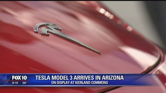 IT'S HERE: Tesla's Model 3 electric car on display in Arizona