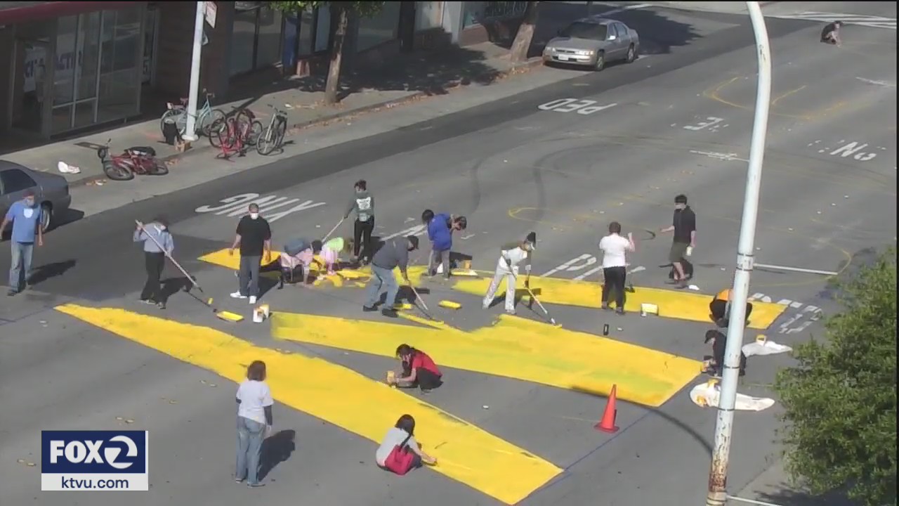 Artists paint massive message on the streets of Richmond