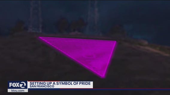 Crew prepares iconic Pride pink triangle atop Twin Peaks, but with lights