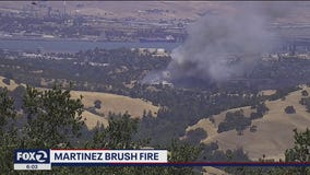 Martinez brush fire contained