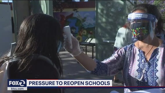 Pressure to reopen schools