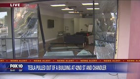 Tesla crashes into Chandler building