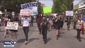 More than 100 protesters march through Walnut Creek