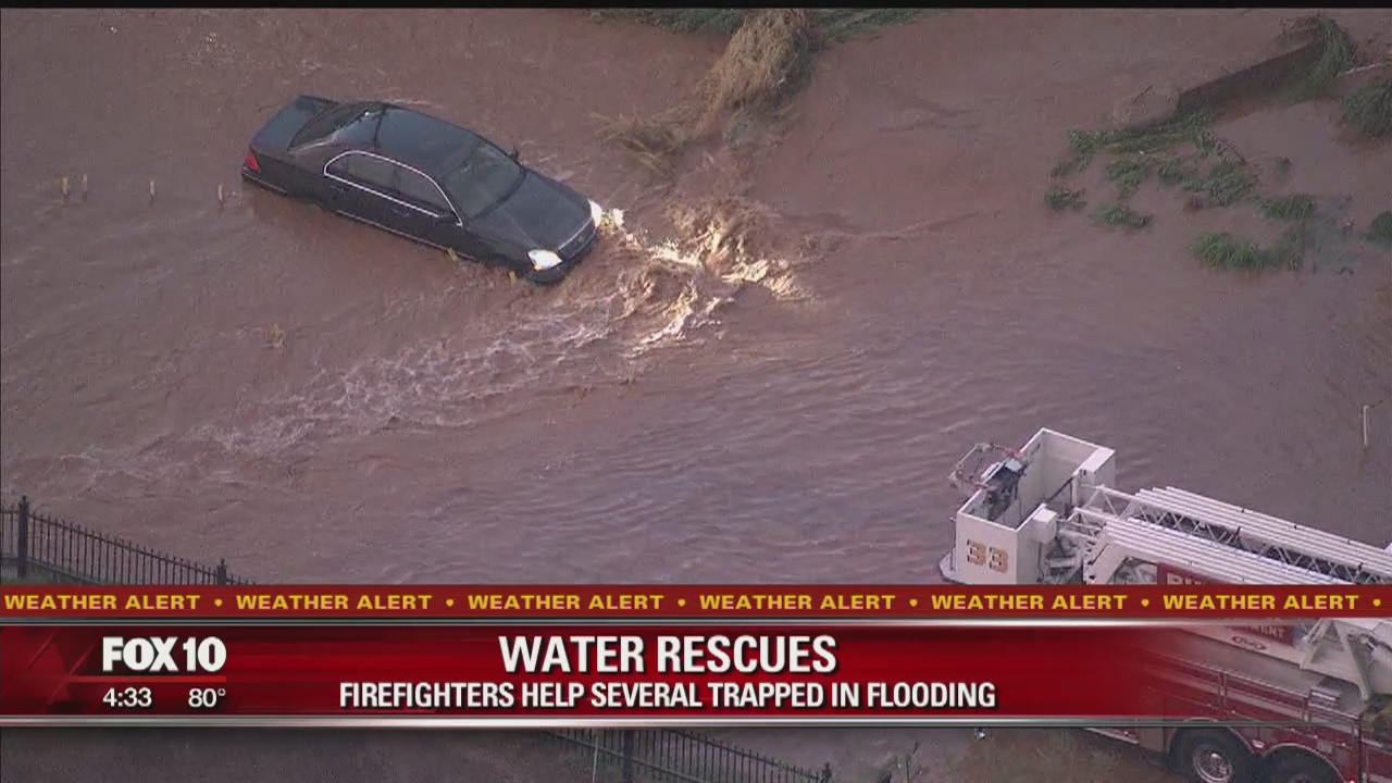 Crews rescue drivers in Sunnyslope neighborhood due to flooding
