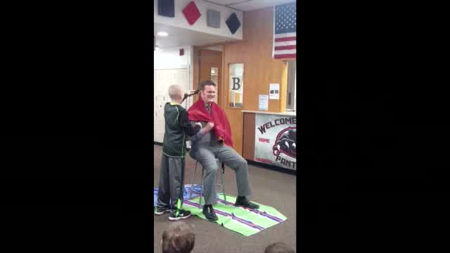 Principal shaves head after bald boy is teased in school