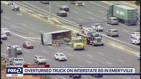 Overturned box truck carrying lettuce blocking lanes on I-80 near the MacArthur Maze
