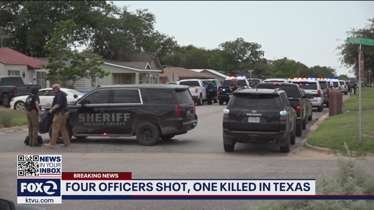 Four officers shot, one killed in Texas