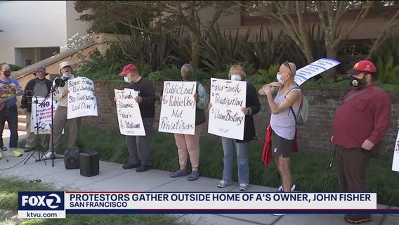 Oakland workers protest at A's owner's house against stadium plans