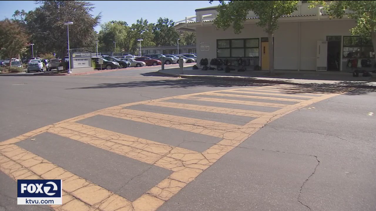 As school resumes, crossing guards are dealing with increased dangers