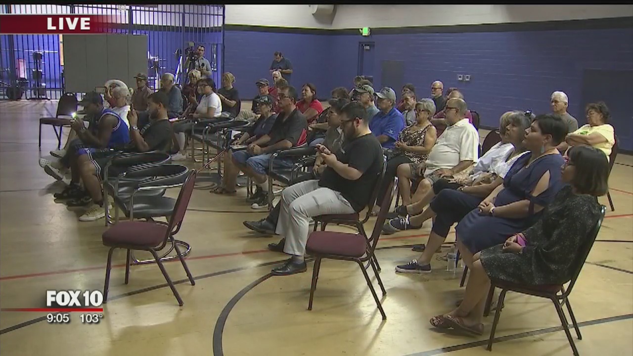 People gather for mass shooting vigil in Phoenix