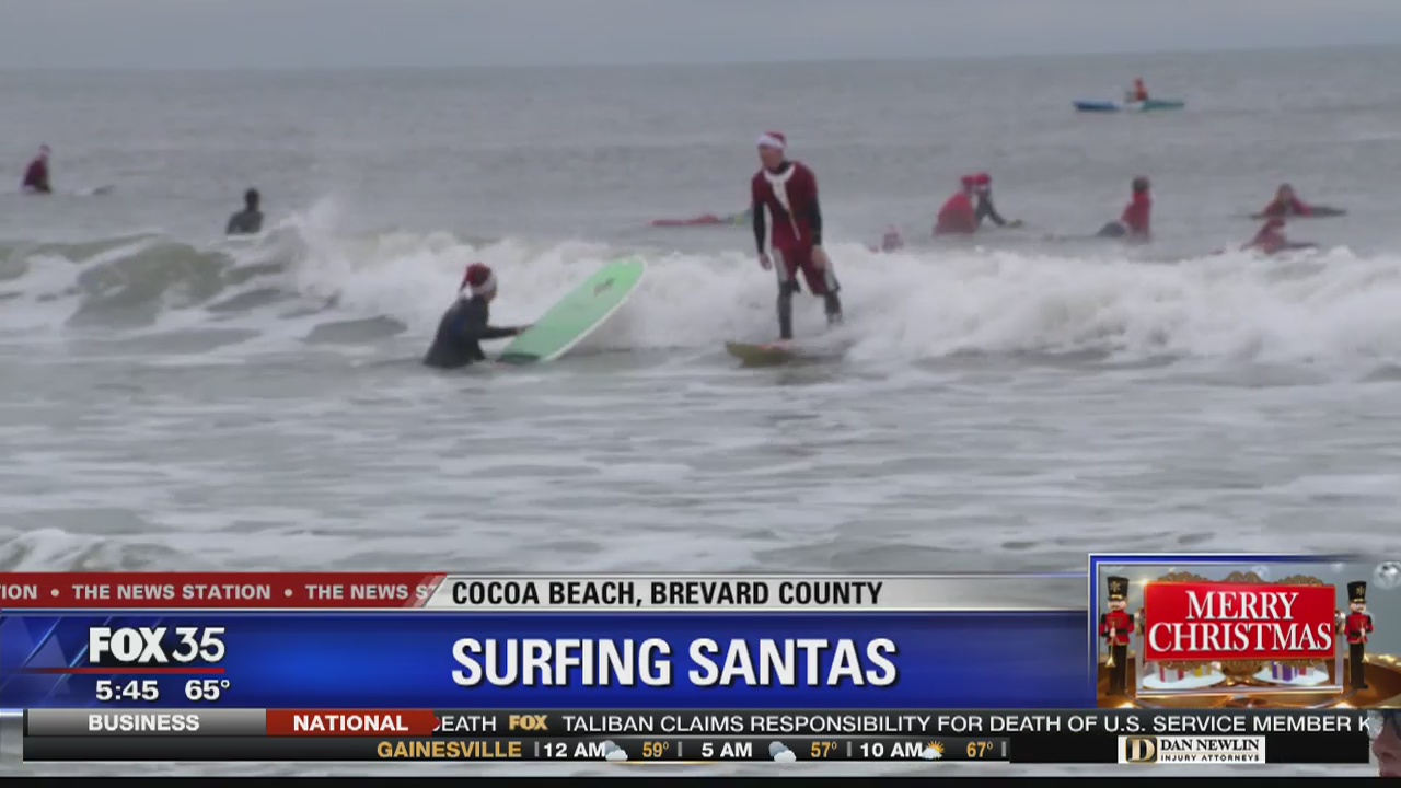 Surfing Santas hit Cocoa Beach
