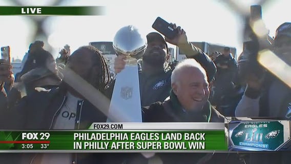 Eagles bring Super Bowl trophy to fans at airport